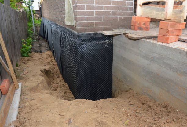 Happy homeowners after waterproofing job in Mount Laurel